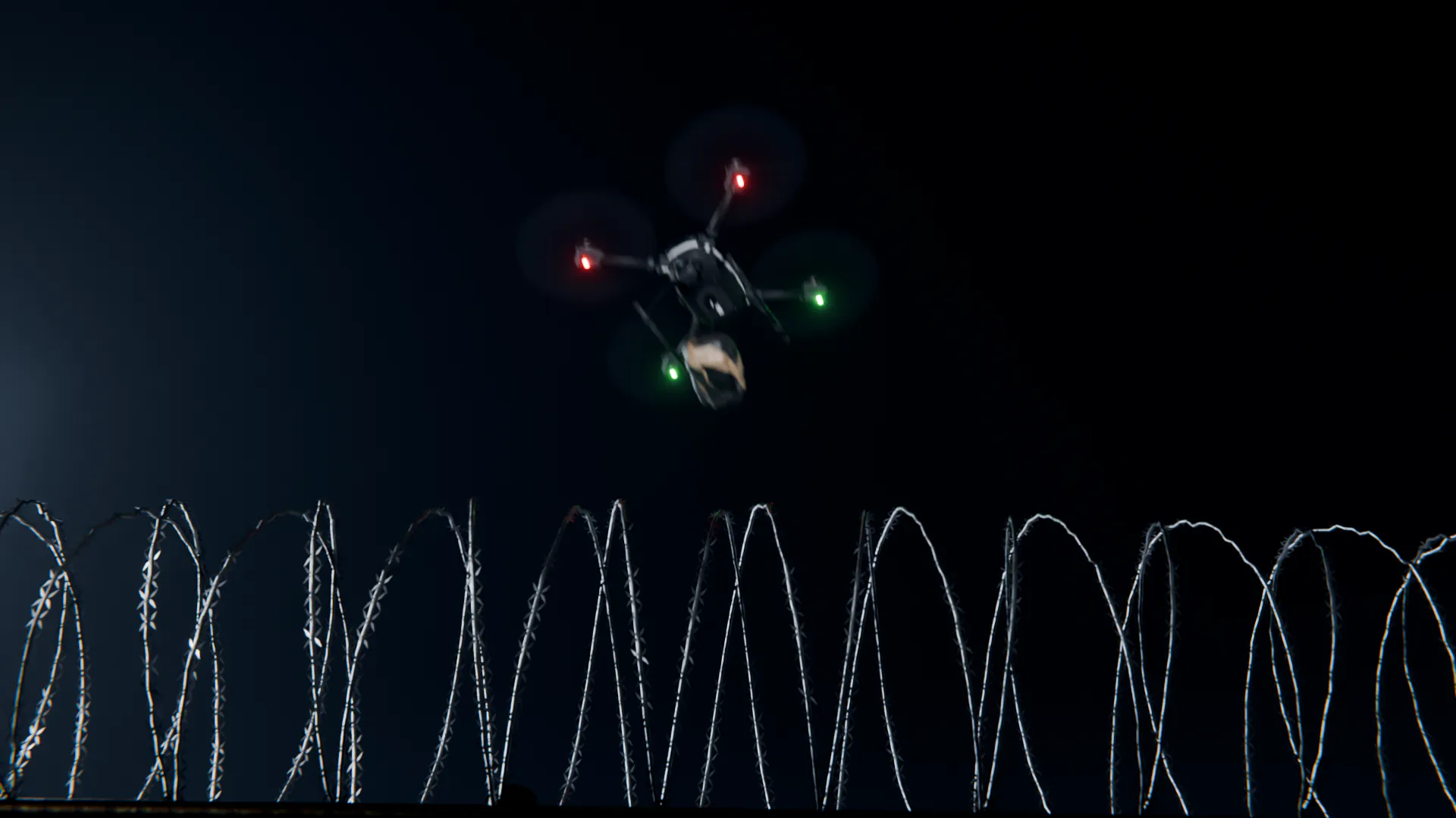 At night, a drone carrying a taped package crosses the razor wire on top of a prison fence.