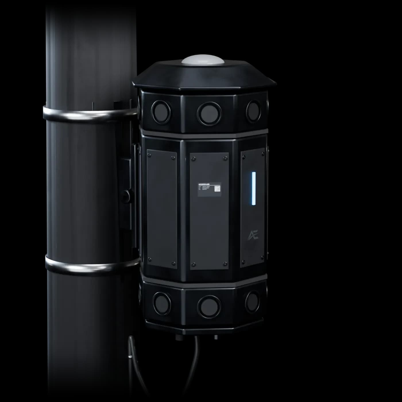 A dark octagonal sensor package strapped with steel bands to the side of a light pole